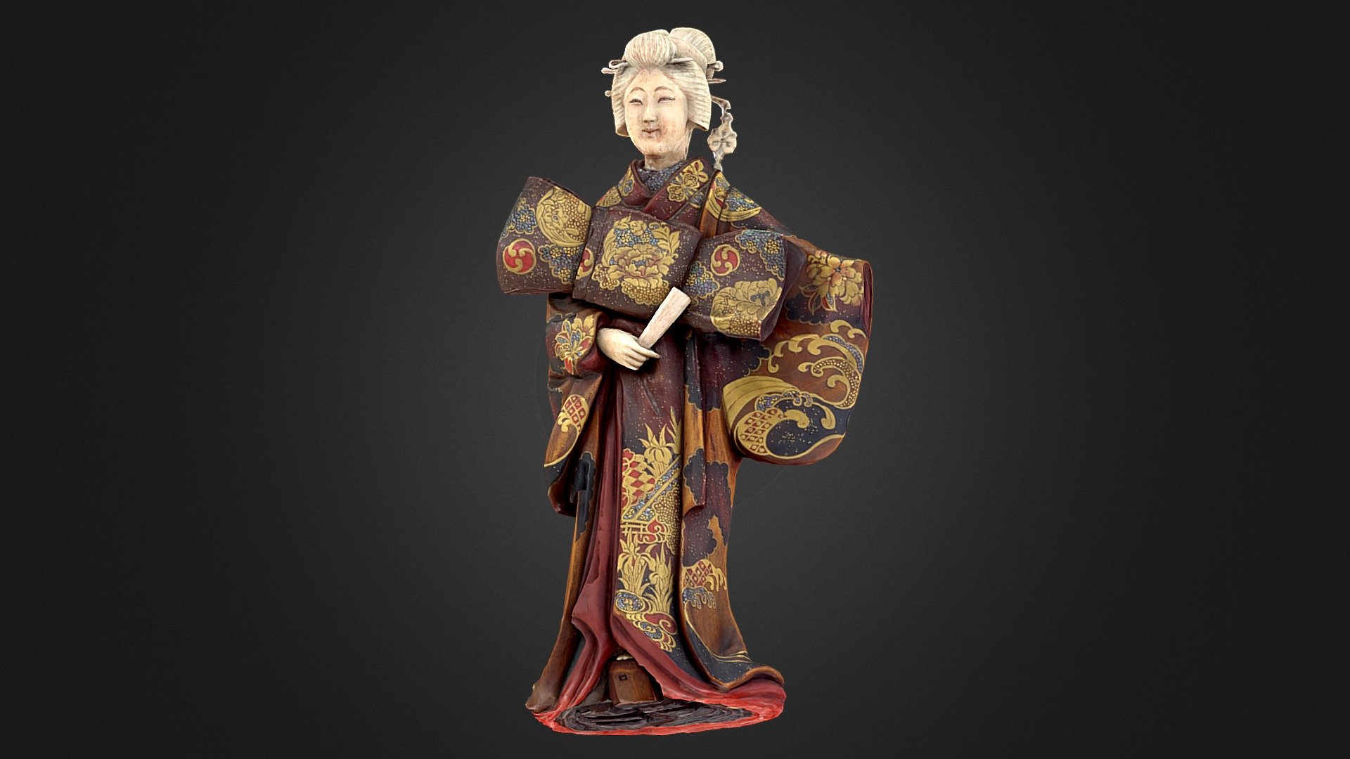 Japanese wood and ivory figure of a Geisha.