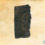 Carved wooden panel