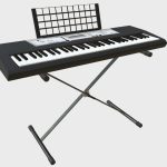 Electronic piano keyboard on stand