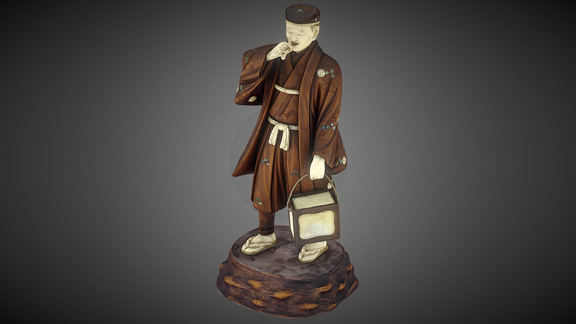 Japanese Meji period statue of a man smoking