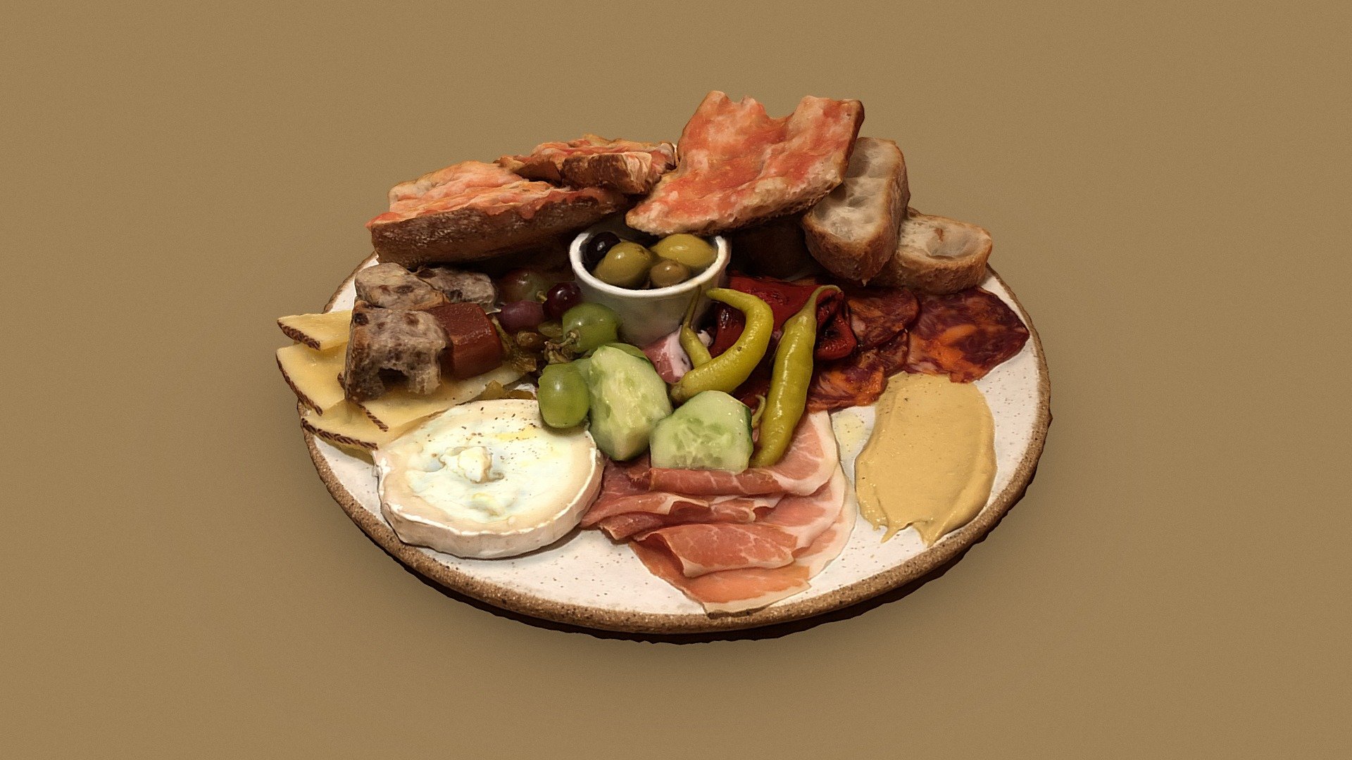 Appetizer plate with cheese and cured meat