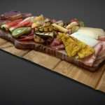 Cold meat, cheese, vegetables and fruit plate